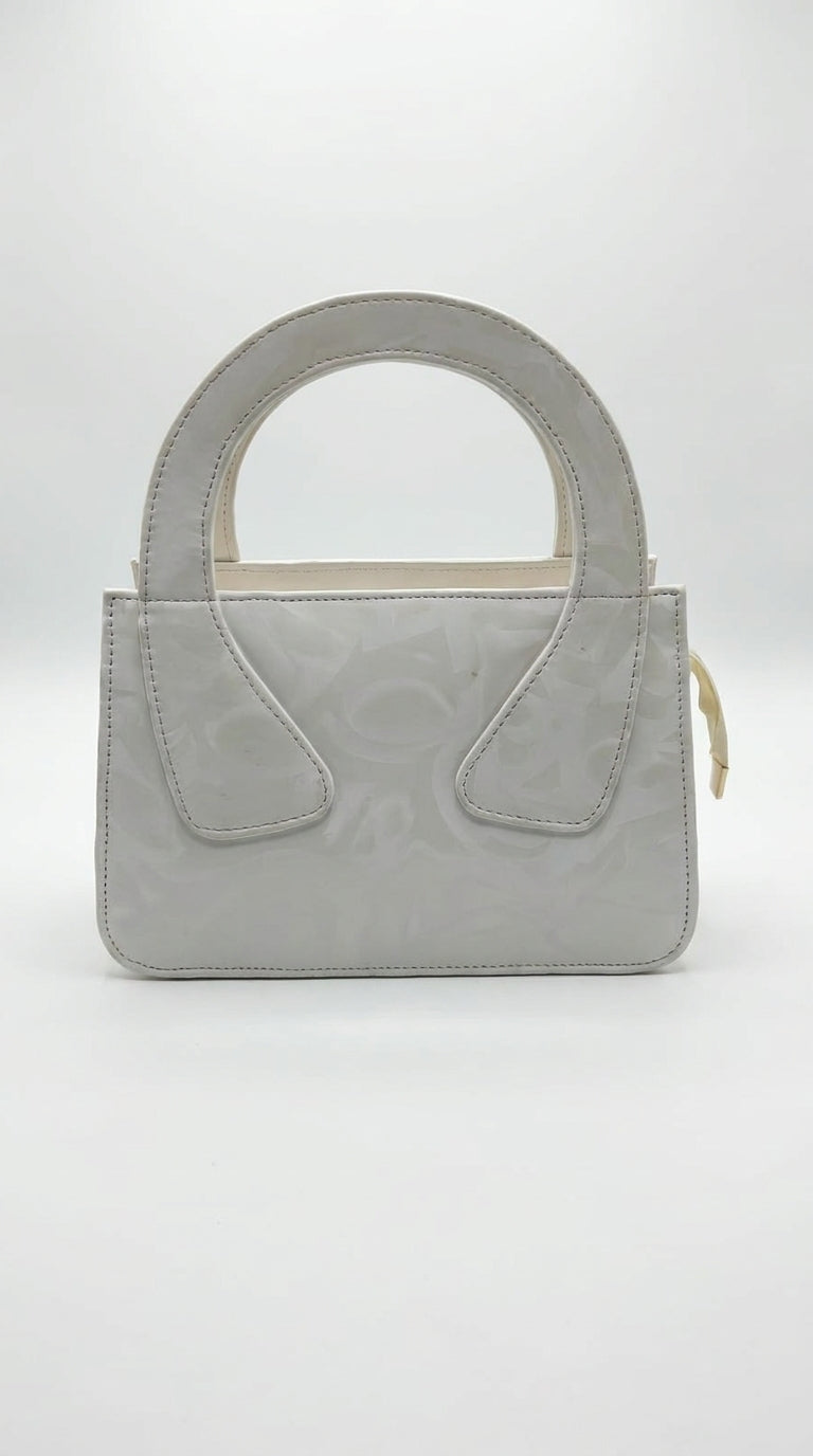 Elegant White Handbag with Golden Detailing 🤍✨